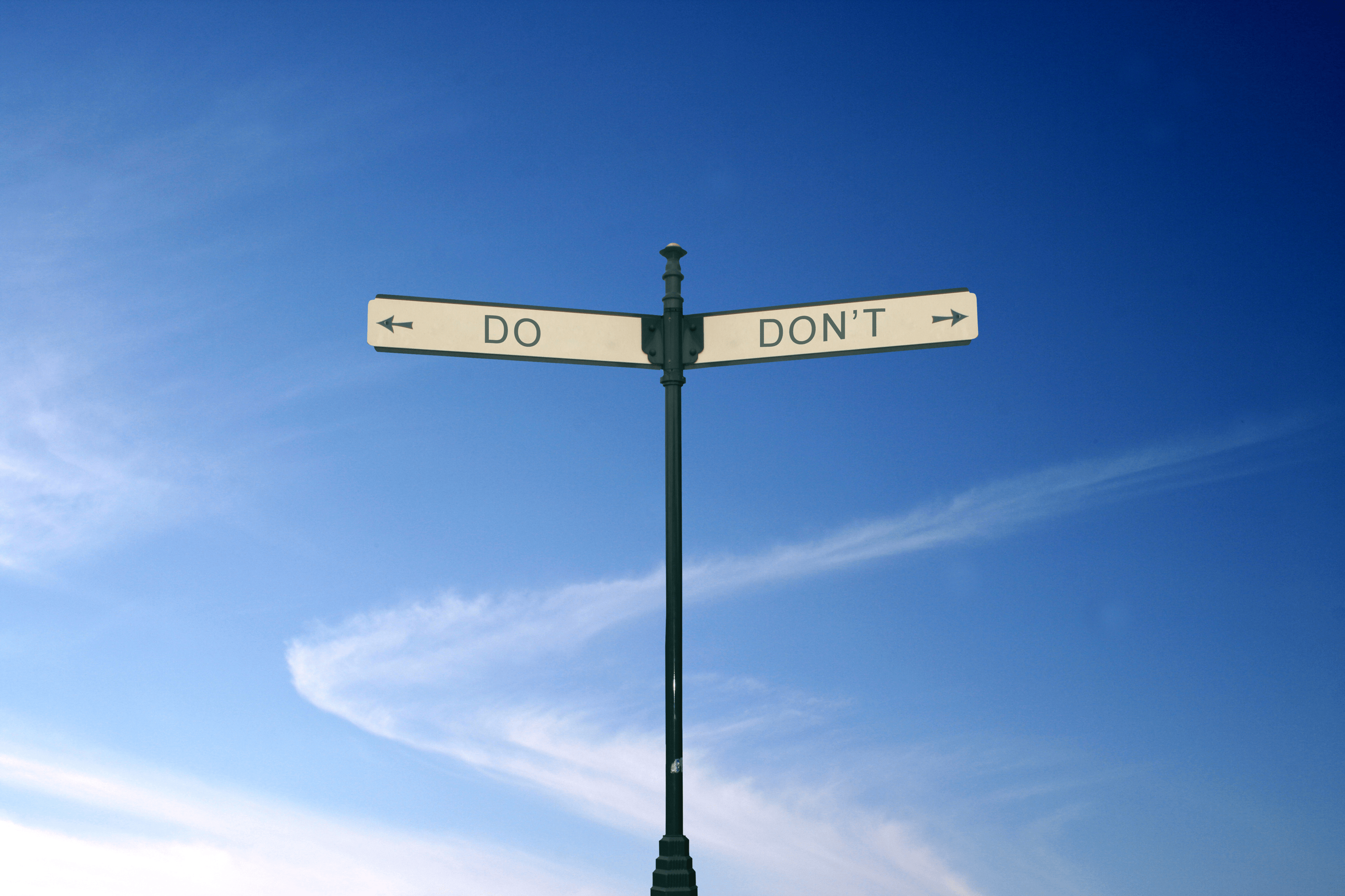 A sign pointing to the dos and don'ts of test automation